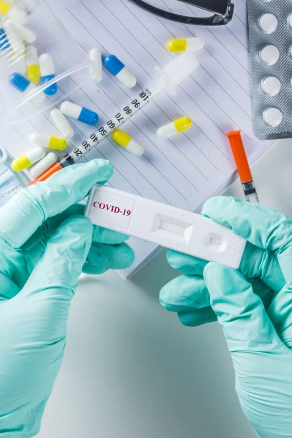 Family-First-Urgent-Care-Conroe-COVID-19-Tests-FAQs-What-Factors-Affect-Costs-600x900